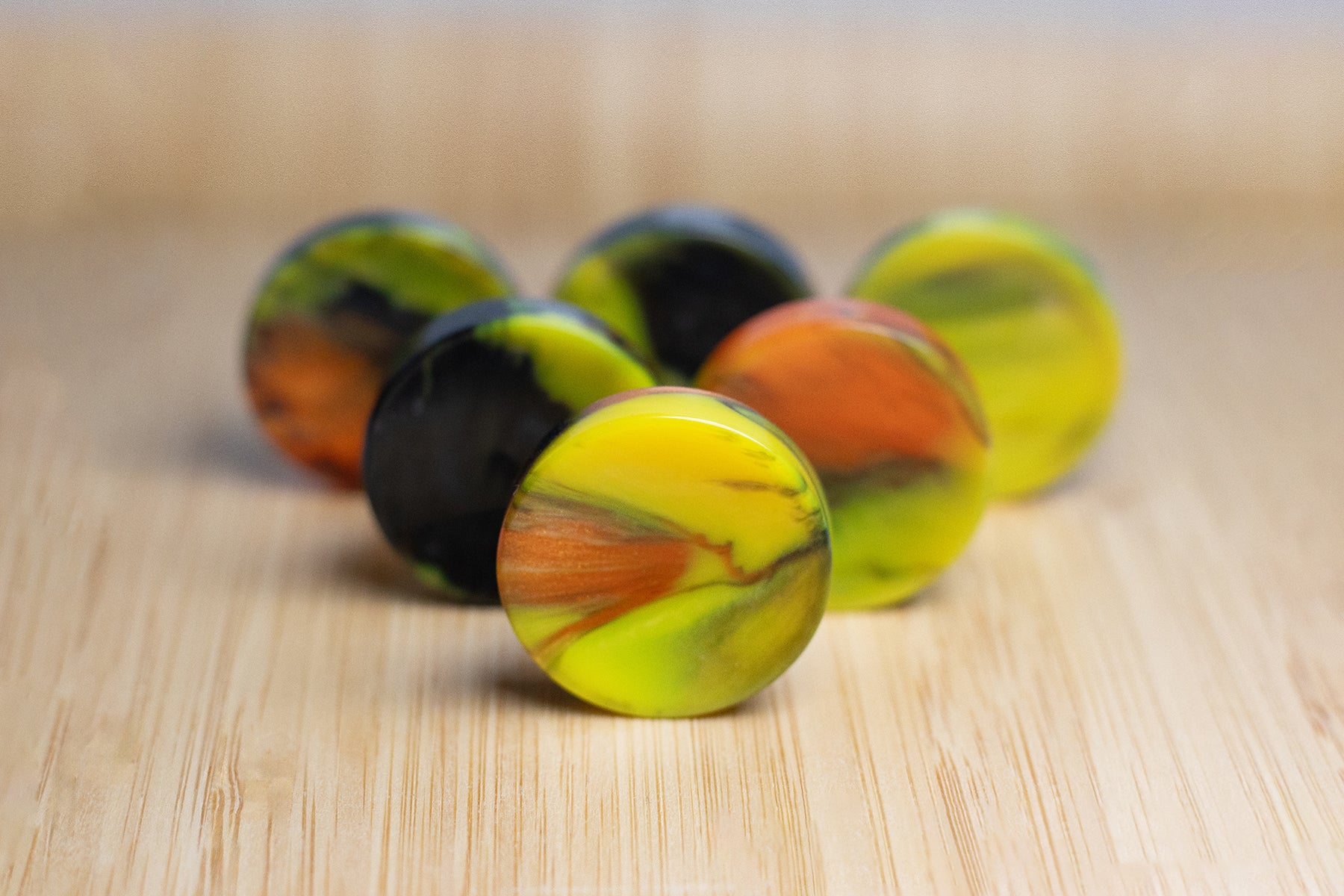 "Enrico" Yellow Black & Orange Upcycled Bowling Ball Worry Stone