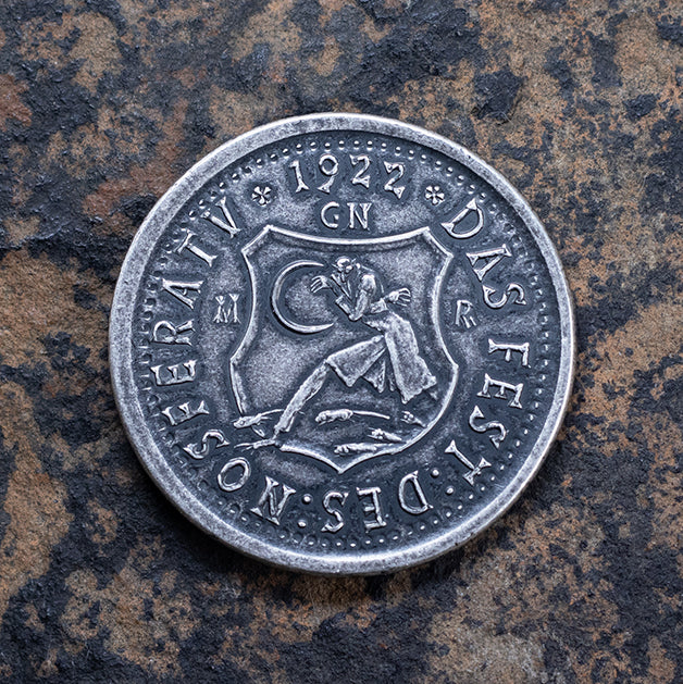 Flip side of silver coin depicting Albin Grau's famous promotional artwork for the 1922 Nosferatu film