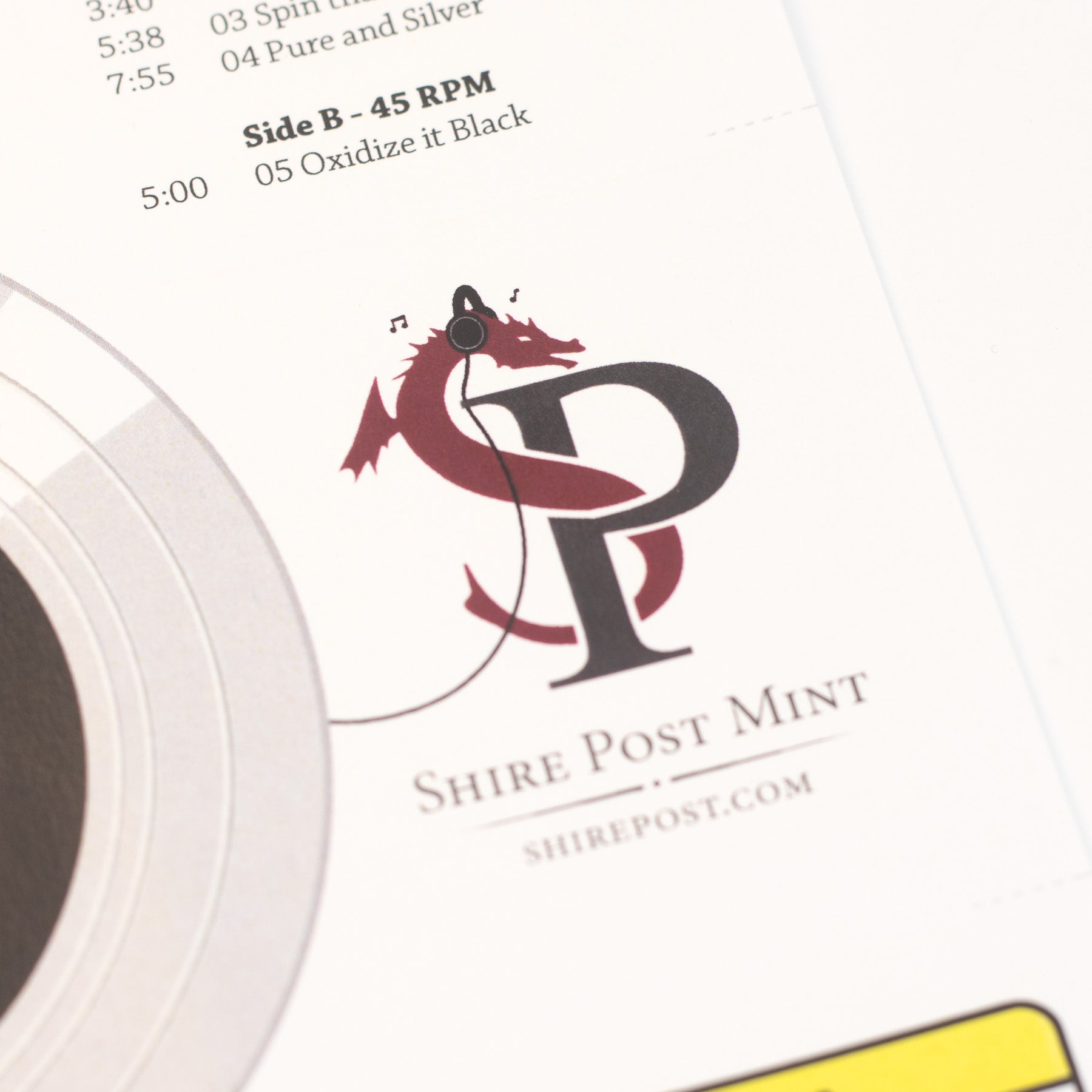 Shire post mint logo with headphones