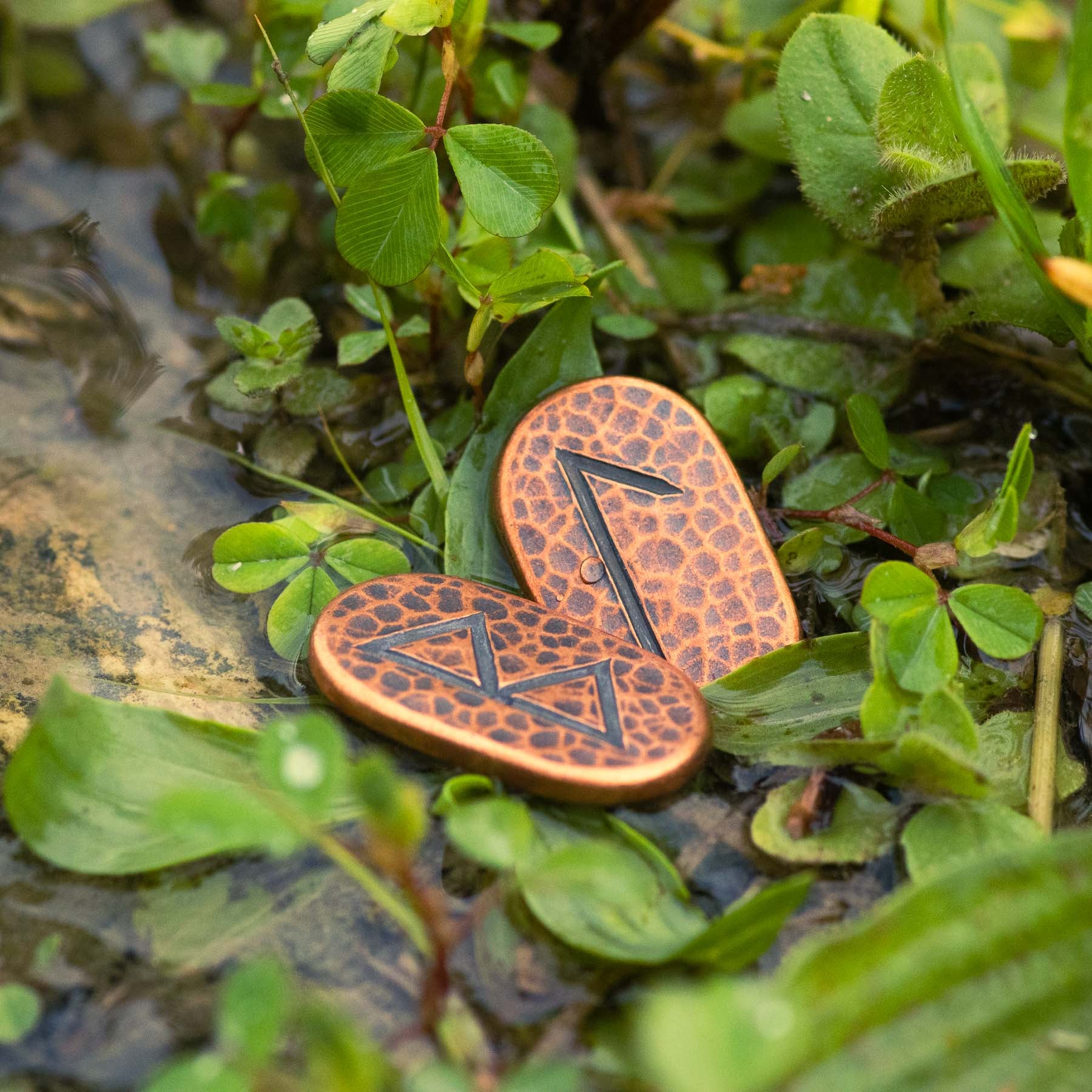 Berkana and Laguz Elder Futhark Runes in solid copper by Shire Post Mint